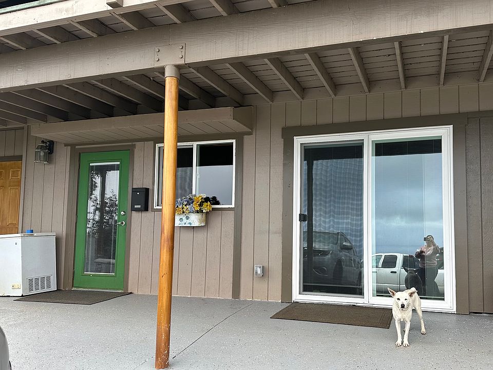 Enter from the green door into your living room. Bedroom offers a sliding class door.