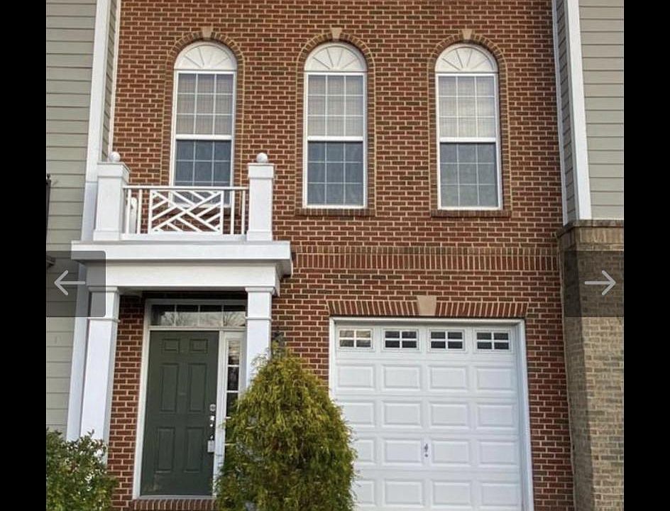 Beautiful 3 level town house with 4 BR/ 3.5 BR , 1 car garage, in unit laundry for rent