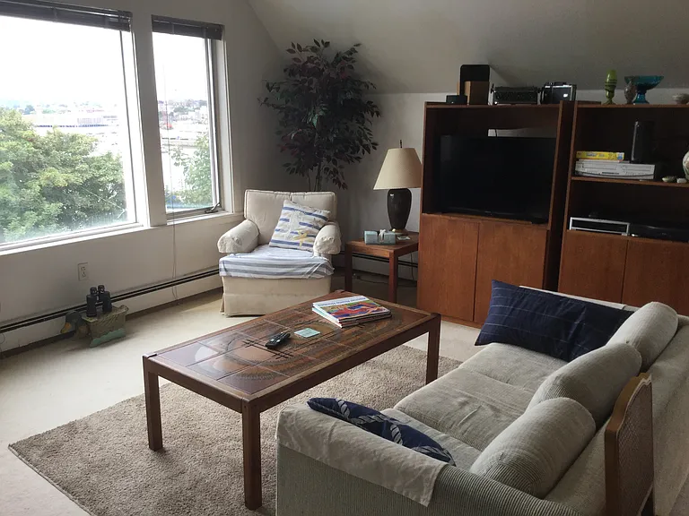 Living room overlooking Gloucester Harbor