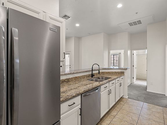 11-web-or-mls-2028 E River Rd 203-8_10022026