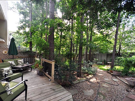 Park-like backyard offers privacy and a pretty view.