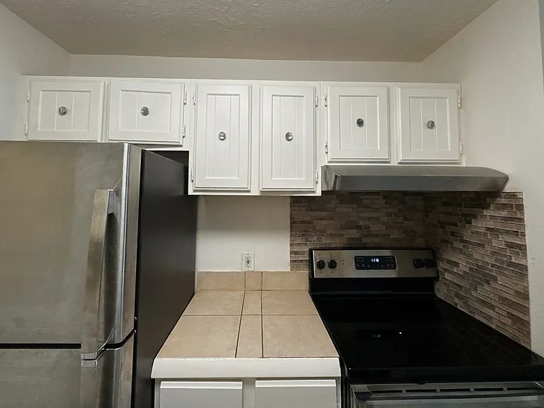 Kitchen with stainless steel appliances
