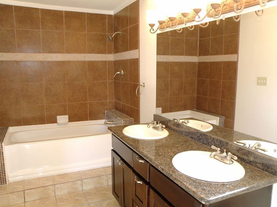 Granite, tile and separate shower in master bath