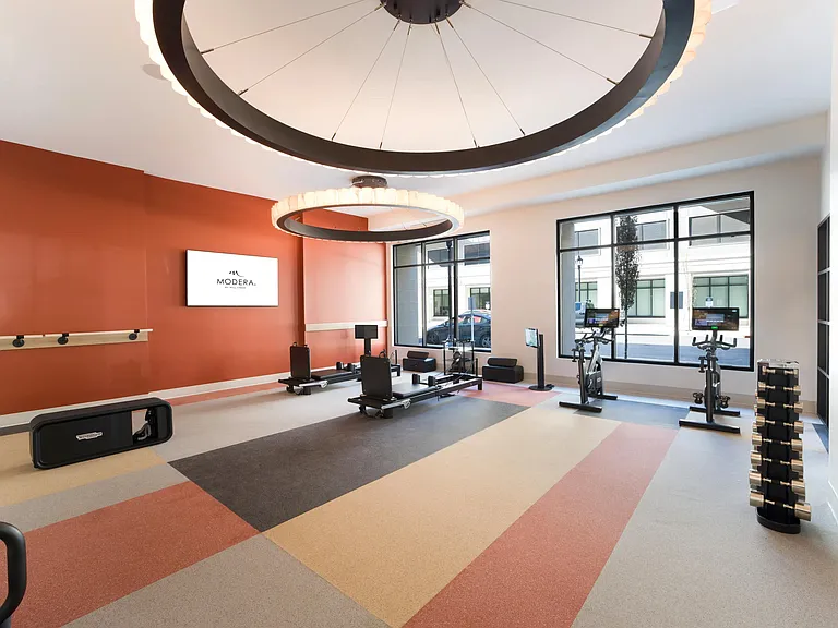A dedicated yoga and pilates studio designed for strength training, stretching, and instructor-led sessions, with flexible equipment and an open, energizing layout.
