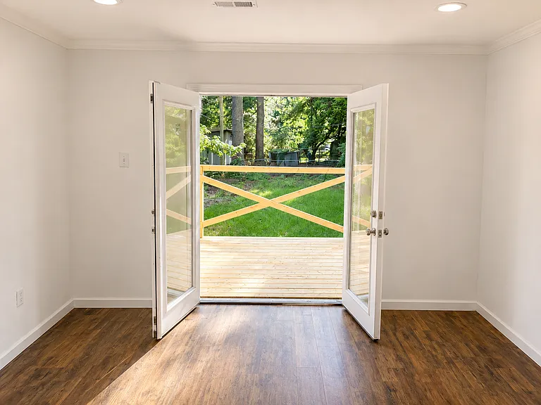 Spacious living room with new ceiling fan, flooring, and four dimmable lights. 

Photo Note: Photos have been lightly enhanced to improve lighting and image quality. Colors, finishes, and exterior conditions may vary slightly during in-person viewing.
