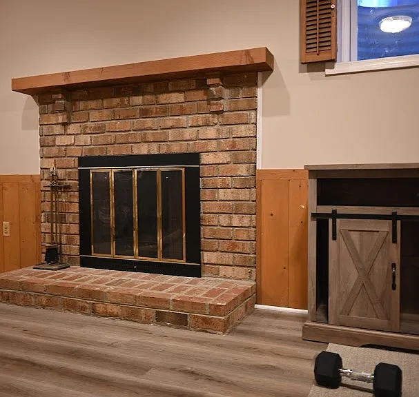 Large finished basement with fireplace and new LVP flooring
