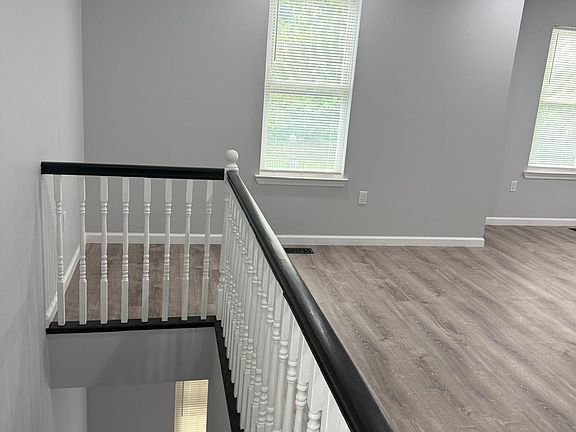 Common area stairway leading to Living Room