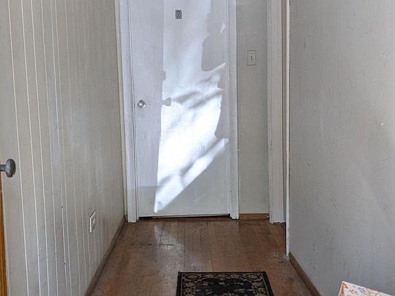 Hallway access to the fuse floor apartment and second floor apartment 0