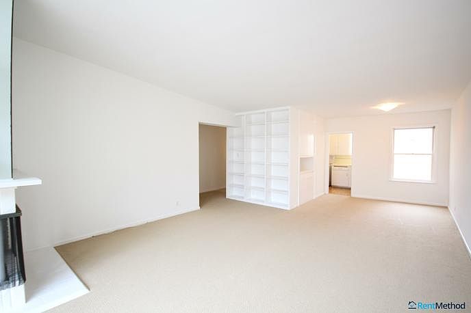 Spacious Living Room with Built-In Shelving