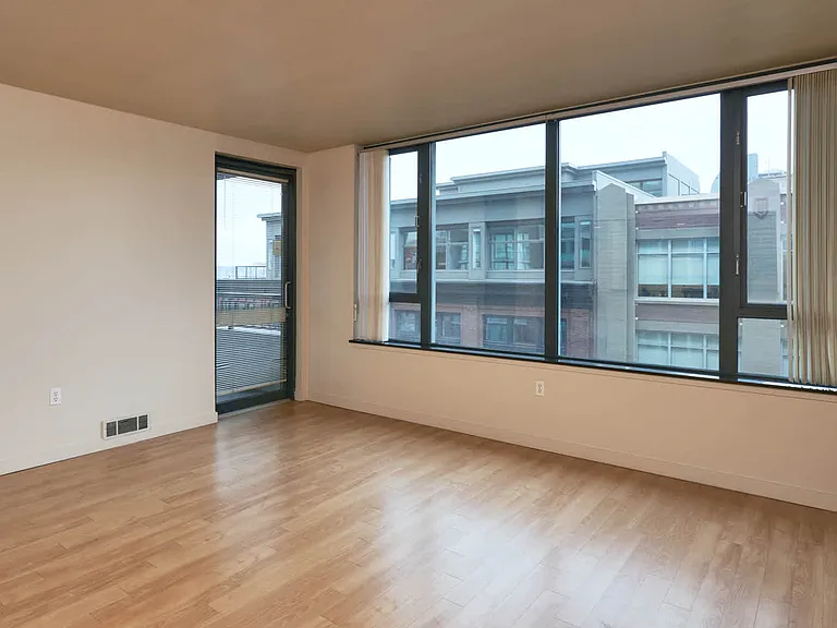 Living Room with Balcony and Hard Surface Flooring