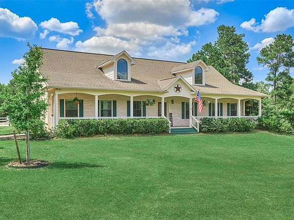 The single story white brick home is fully fenced and cross fenced! Sit and relax with your morning coffee on your large front porch!