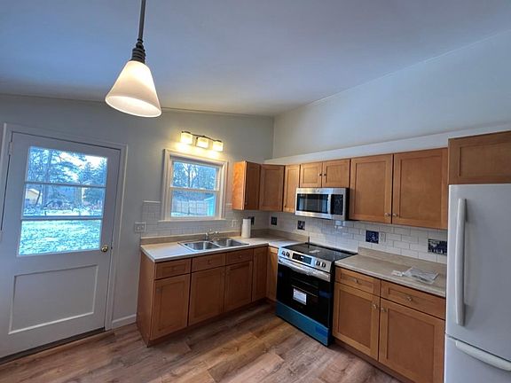 Eat in kitchen with new stove and microwave