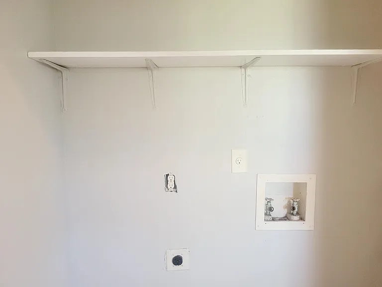 Washer and Dryer Hookup with Storage Shelf