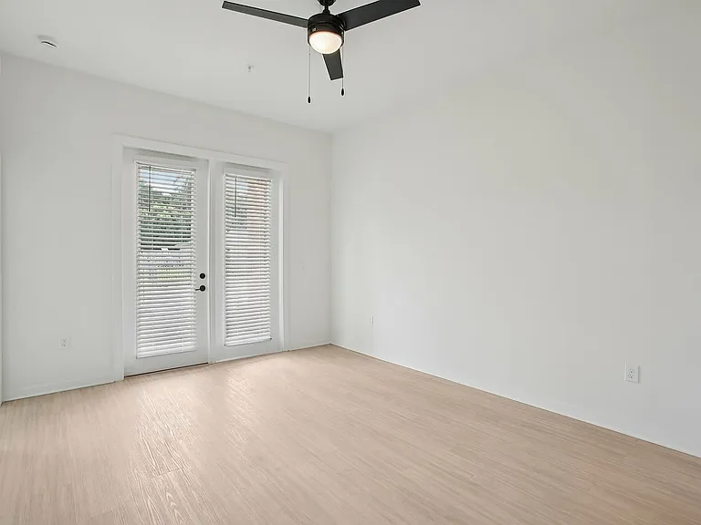 Living Room with Wood Style Flooring and Ceiling Fan