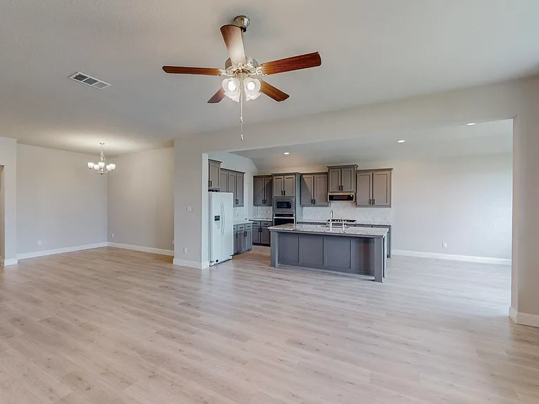 There is also an open-concept formal dining area that will make hosting a breeze