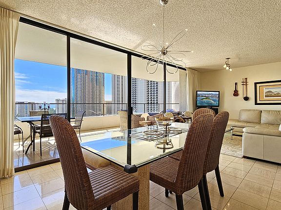 Ceiling to Floor Lanai Windows in living room facing Diamond Head, Fort DeRussy and the ocean