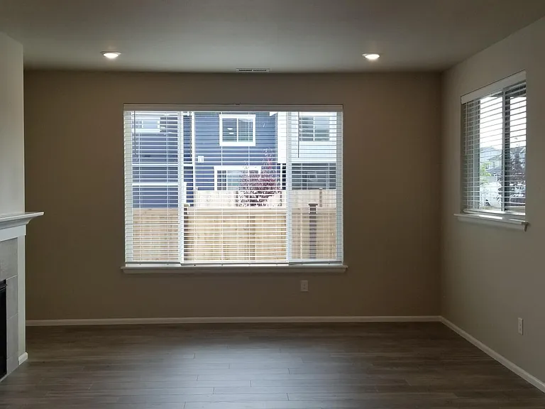 Cozy living area with great natural light .