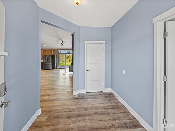 Convenient storage closet in the entry and the 1st bedroom on your right.>