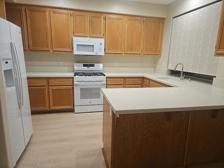 Kitchen with new appliances and countertop
