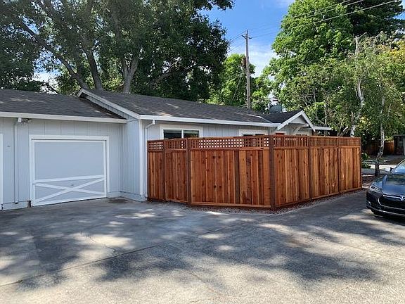 One car garage which includes washer and dryer hook ups inside.