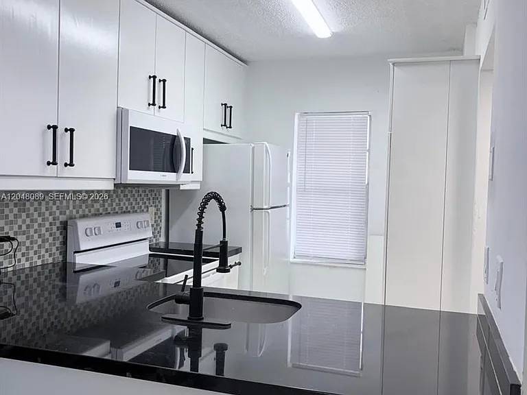 8305 Royal Palm Blvd #103 — Photo 1