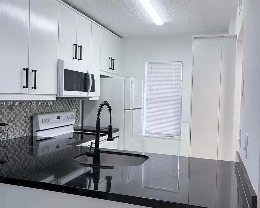 8305 Royal Palm Blvd #103