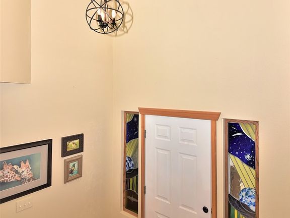 Stain glass art work in entry is gorgeous!