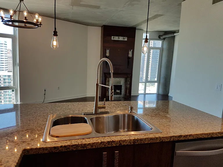 Kitchen bar looking into living room area