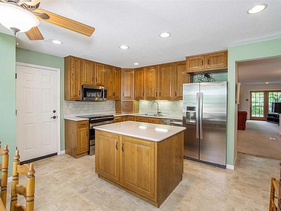 Features premium quartz counter tops, and stainless steel appliances.