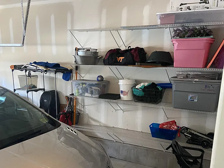 Right side of two-car garage with repurposed shelving
