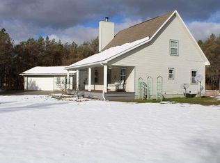 94 Wood Rd NW, Rapid City, MI 49676