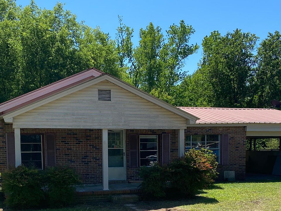 Front view with carport