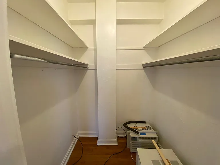 A true walk-in closet provides abundant shelving and hanging space, helping keep your living area organized and clutter-free.