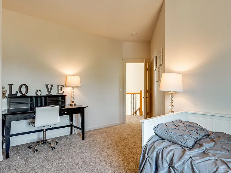 Sleep up to four in this large bedroom with bunk beds and twin bed with trundle.