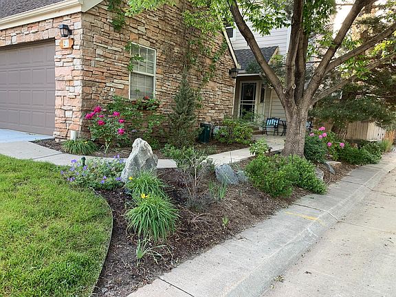 Professionally landscaped front entry