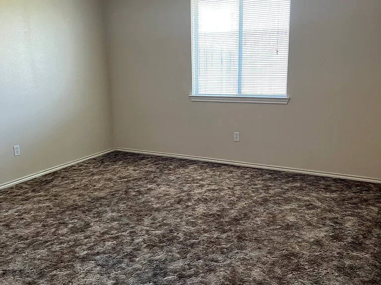 The Master Bedroom is approximately 12' X 12
room enough for a king size bed, and night stands on both sides.