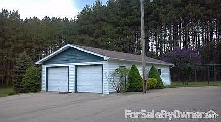 Detached two car garage
						:
						2 stalls plus workshop in the back