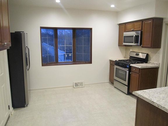 Dining room flows into open new kitchen