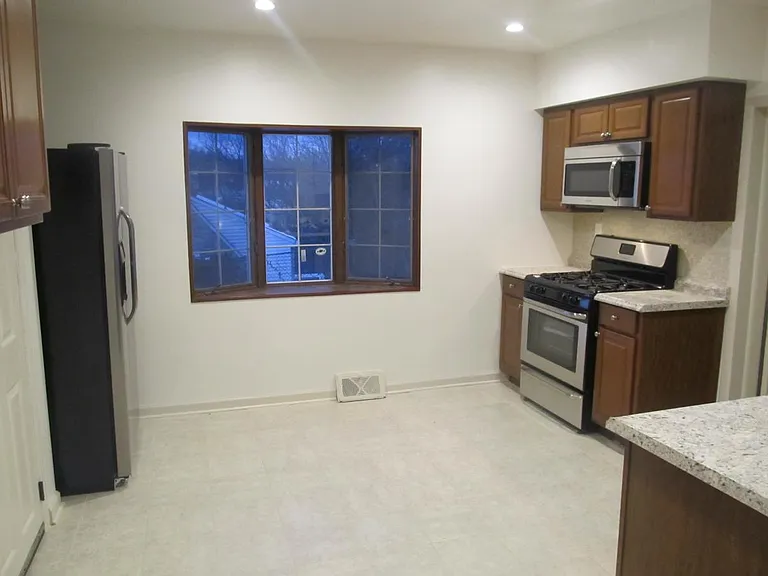 Dining room flows into open new kitchen
