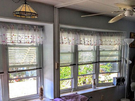 BAY WINDOWS IN SUNROOM