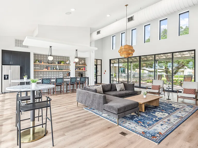 Resident Clubhouse: Catering kitchen, couches, and TV
