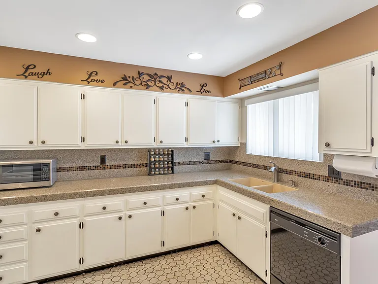 Enjoy granite countertops in your fully stocked kitchen with plenty of like-new dish ware, cookware and bakeware.