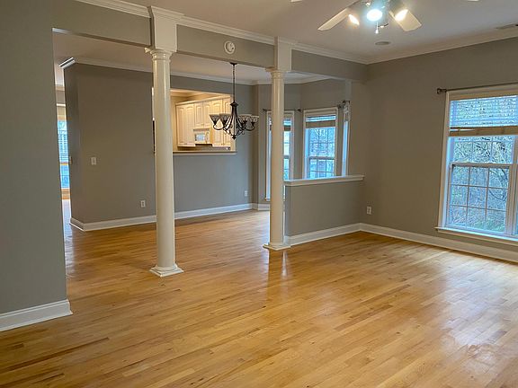 View of living room into dining room and part of the kitchen