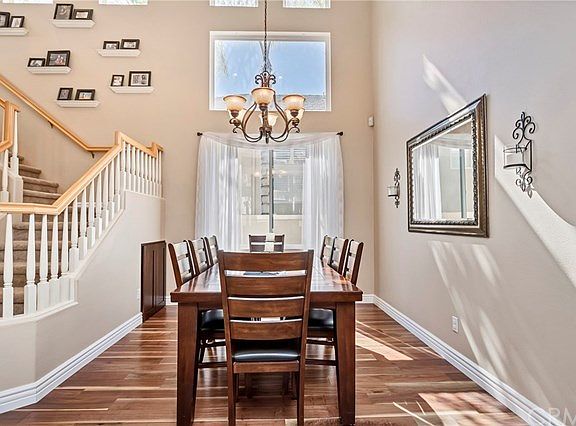 Formal dining room with high soaring ceilings