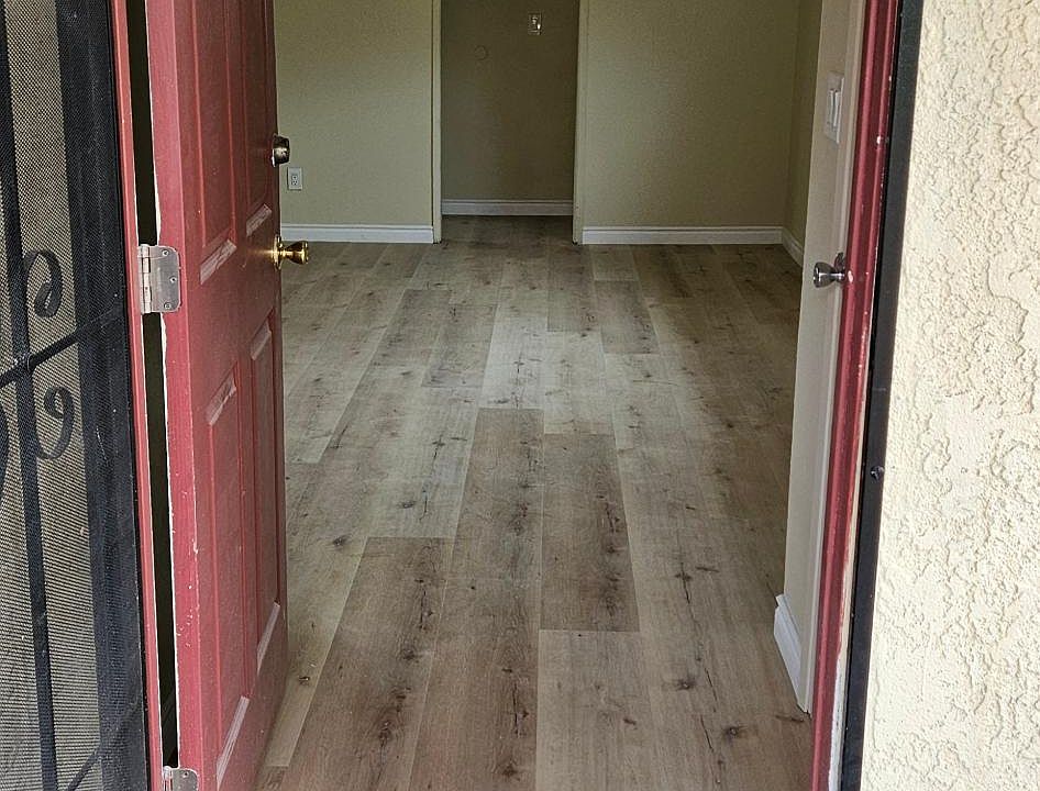 Front door opens to large living room