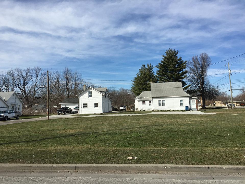 1144 is a small dwelling on the left of the large house,