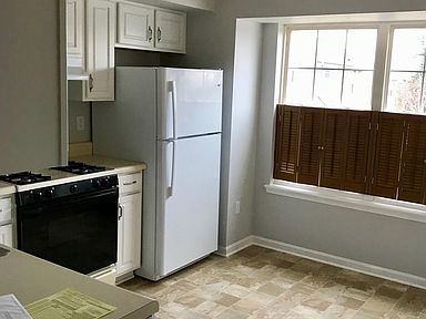 Spacious kitchen has room for a breakfast table