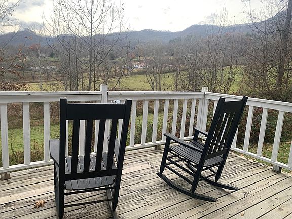 Enjoy the mountains and cattle from your private deck