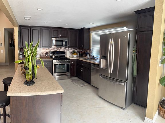 3rd image of 6990 E Creek Side Ln