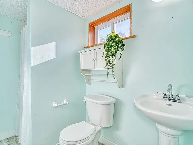Basement bathroom with shower.